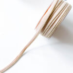 Paspelband Lurex beige/gold 10mm